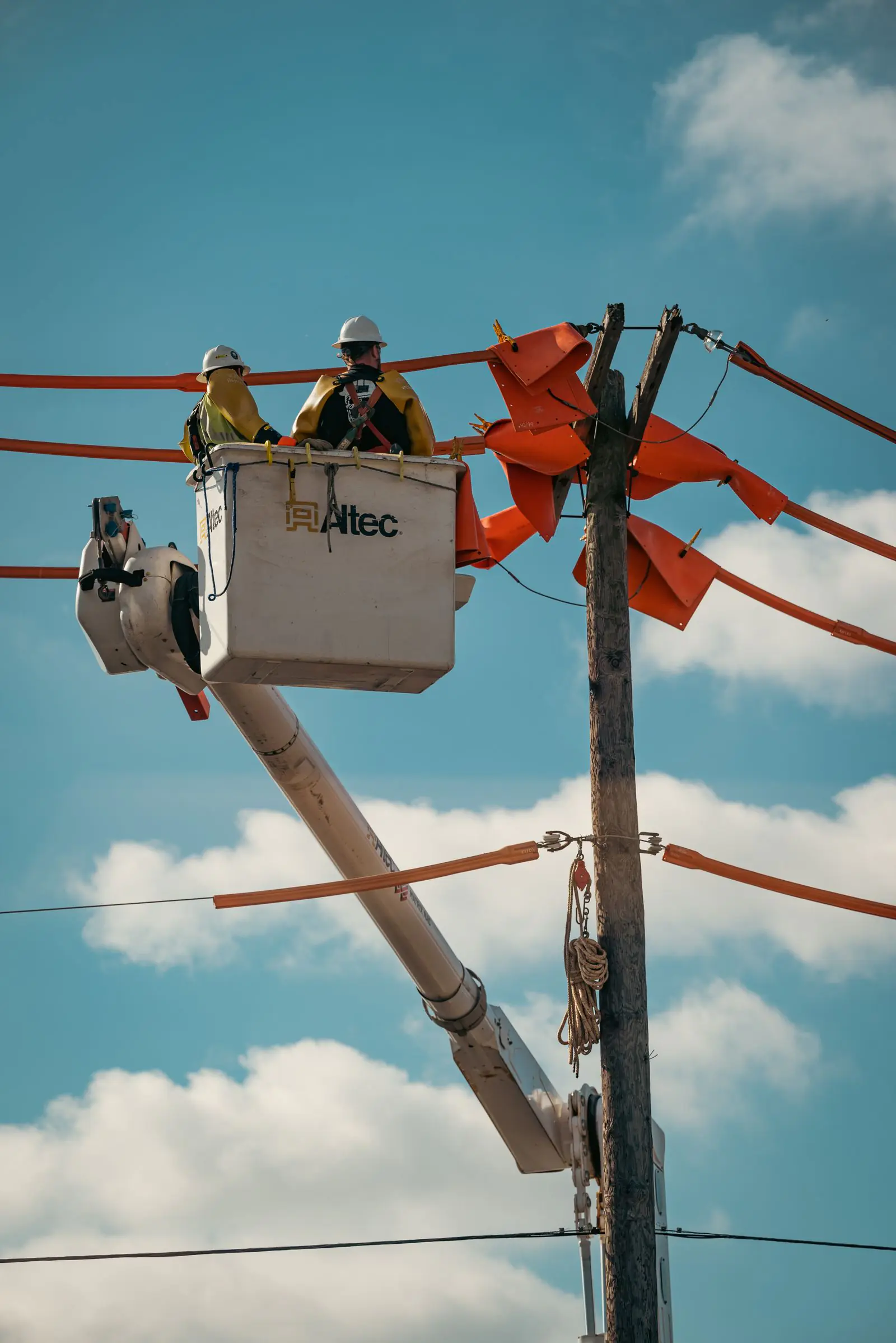 Crew working from a bucket truck
